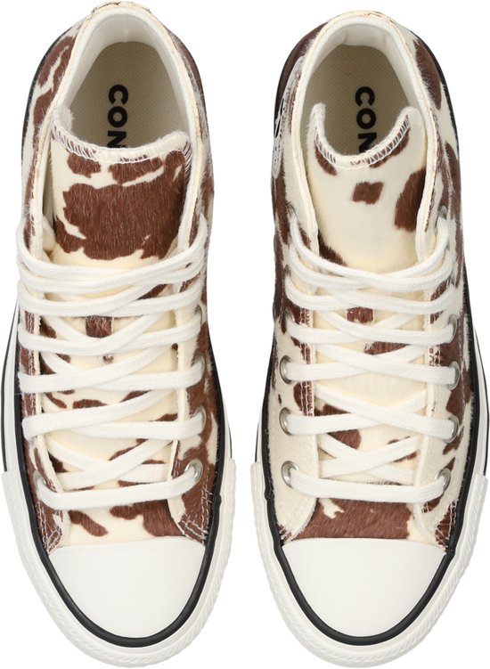 Dessus de converse Chuck Taylor All Star hautes avec imprimé vache marron et blanc.