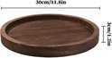 Rond, donkerhouten dienblad met 30 cm diameter en 3 cm rand.