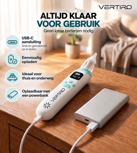 Witte neusreiniger met groene accenten wordt opgeladen via USB-C powerbank. Ideaal voor thuis en onderweg.