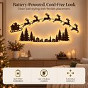 Kerstdecoratie met kerstman en rendieren, draadloos en op batterijen voor flexibele plaatsing, met warme LED-verlichting.