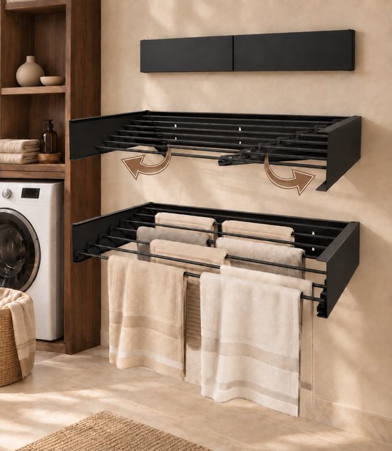 Een uitklapbaar zwart wanddroogrek met meerdere niveaus, met handdoeken en kleding, boven een wasmachine.