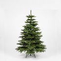 Een volle groene kunstkerstboom op een standaard.