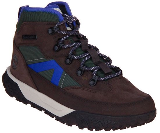 Bruine Timberland wandelschoen met groene en blauwe accenten, en een paarse voering.