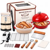 Complete broodbakset met rijskast, rode gietijzeren pan, fermentatiepot, mand, spatel en gereedschap.