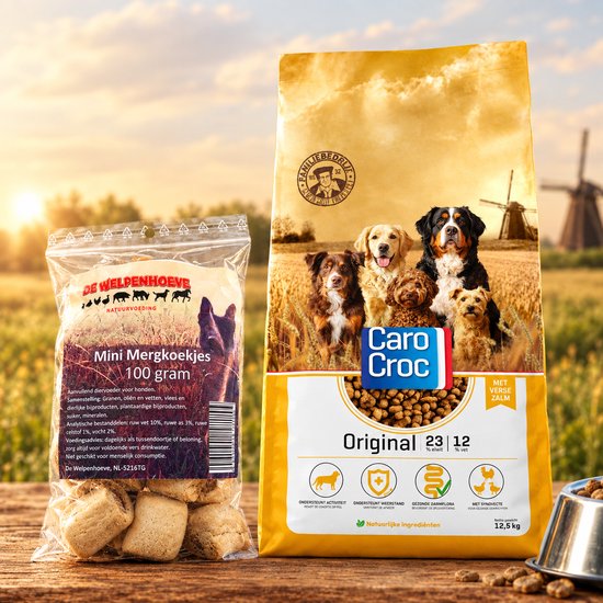 Grote zak hondenvoer van CaroCroc Original 12,5 kg met een afbeelding van vier honden en molens op de achtergrond.