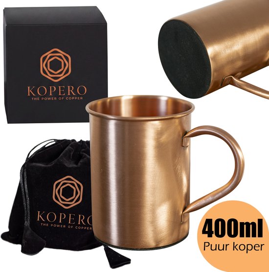 Koperen mok, 400ml, met handvat. Naast een zwarte draagzak en een zwarte geschenkdoos. Puur koper.