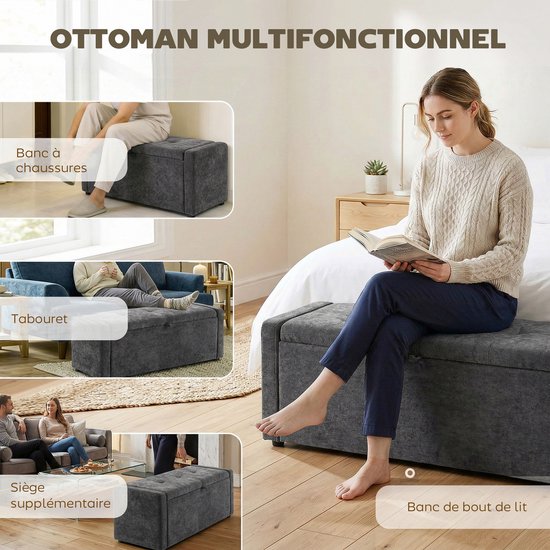 Donkergrijze opbergpoef in een slaapkamer, gebruikt als zitje en bankje aan het voeteneind.