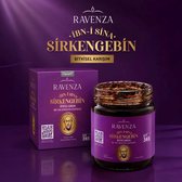 Paarse pot en doos Ravenza kruidenpasta met gouden Ibn-i Sina portret, QR-code en tekst 'Bitkisel Karışım'.