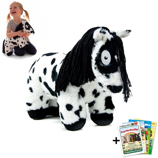 Zwart-witte gevlekte pluche Crafty Pony met zwarte manen en bijgevoegd instructieboekje Paardenknuffel.