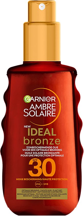 Garnier Ambre Solaire Ideal Bronze zonneolie SPF 30 in een bruine fles met goudkleurige spraydop.