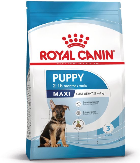 Verpakking Royal Canin Maxi Puppy voeding met een Duitse herder puppy.