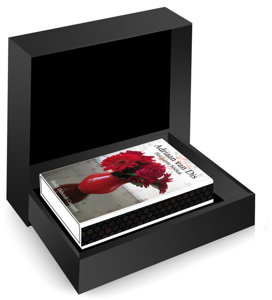 Boek in een luxe zwarte geschenkdoos met zwarte honingraatmotief zijkanten.