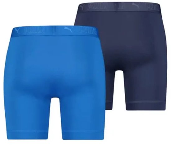 Twee PUMA boxershorts, één blauw en één donkerblauw, met een logo band.