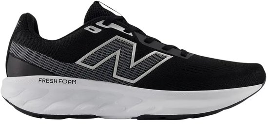 Zwarte New Balance 520 sportschoen met witte zool en zilveren 'N' logo.
