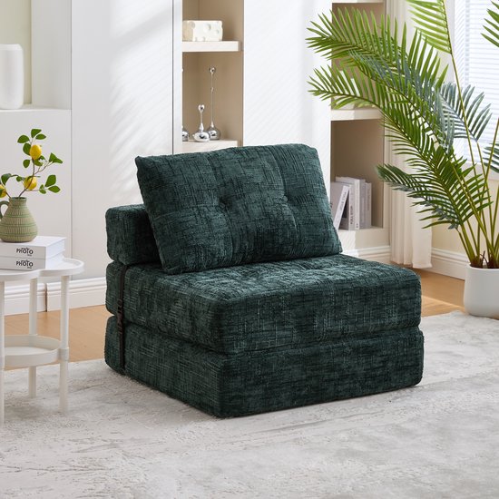 Smaragdgroene chenillestof futon in gesloten positie met gesp.