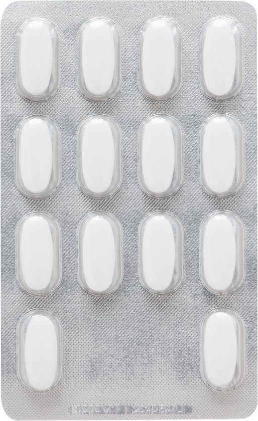 Een blisterverpakking met 12 witte, langwerpige tabletten van Davitamon Magnesium.