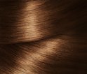 Gedetailleerde textuur van glanzend, goudbruin haar.