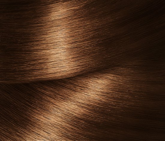 Gedetailleerde textuur van glanzend, goudbruin haar.