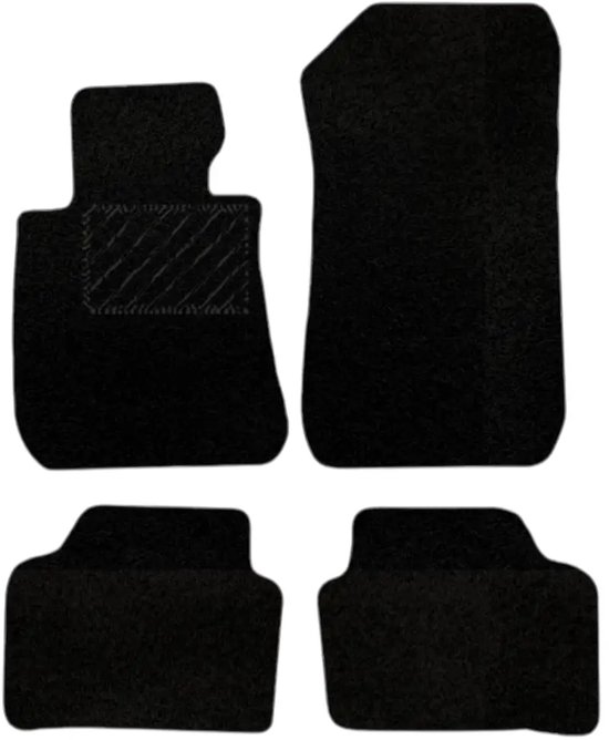 Set van vier zwarte automatten met schuine ribbels.