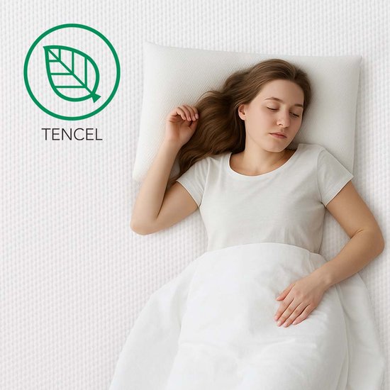 Une femme dort sur un matelas blanc avec un logo Tencel à côté.