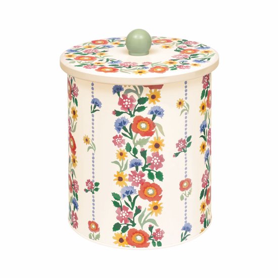 Boîte de conservation ronde avec imprimé floral pastel et poignée verte.