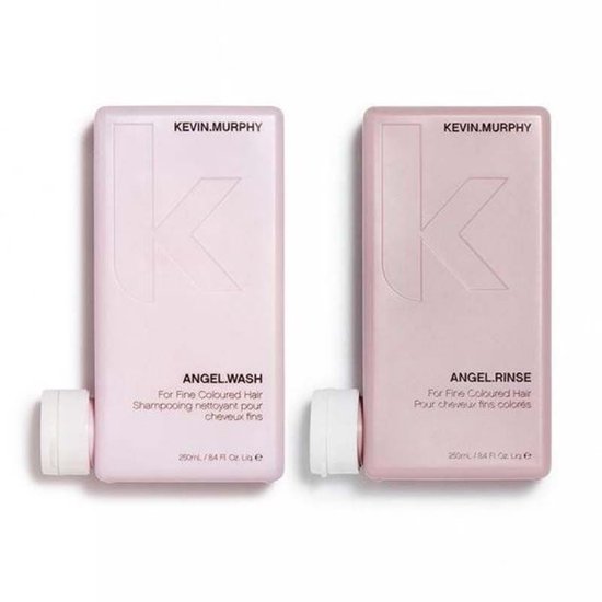 Twee KEVIN.MURPHY flessen in lichtroze. ANGEL.WASH shampoo voor fijn gekleurd haar en ANGEL.RINSE conditioner voor fijn gekleurd haar.