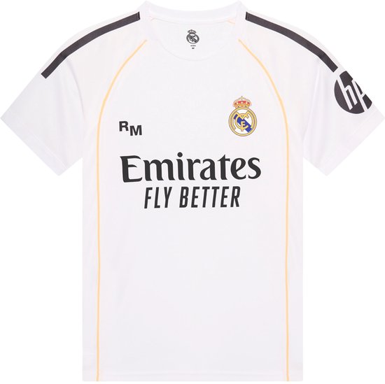 Wit Real Madrid voetbalshirt met 'Emirates FLY BETTER' opdruk, clublogo en oranje accenten.