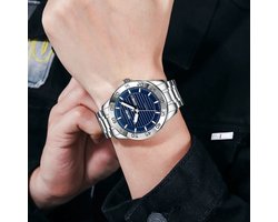 Stijlvolle SKMEI Herenhorloge Zilver met Donkerblauw Wijzerplaat - Luxe Quartz Met Roestvrij Staal, Waterdicht Design & Gratis Elegante Leerella Horlogezakje