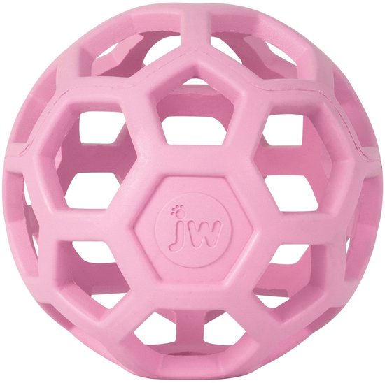 Een roze JW Hol-ee Roller bal met een open, honingraat-achtige structuur.
