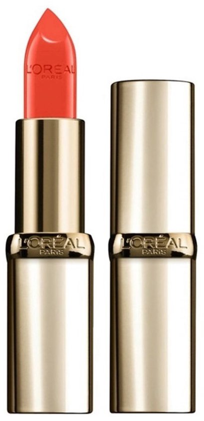 Koraalkleurige L'Oréal lipstick met gouden huls, naast de dop.
