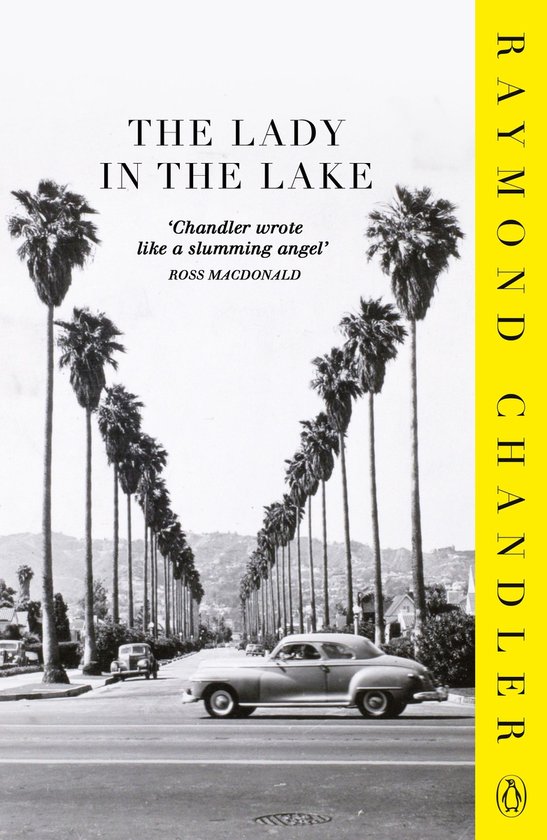 Boekomslag: 'THE LADY IN THE LAKE' door RAYMOND CHANDLER, met een klassieke auto op een laan met palmbomen.