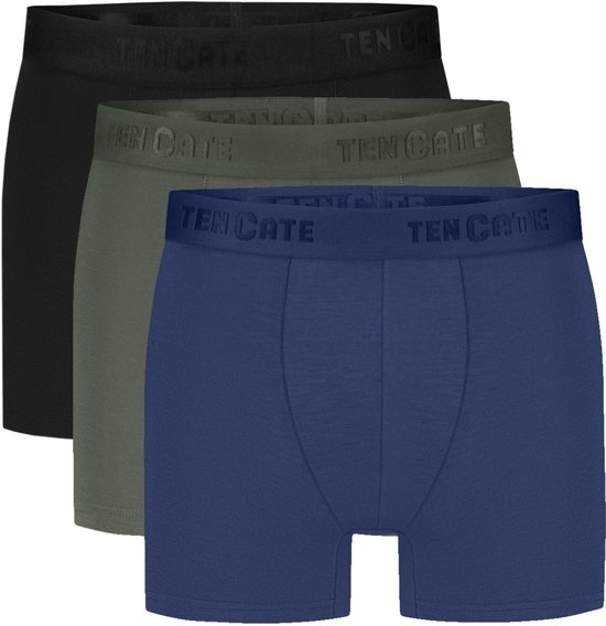 Drie boxershorts van ten Cate in zwart, kaki en blauw. De tailleband is voorzien van een logo.