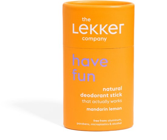 Oranje container met "the Lekker company", "have fun" en "natural deodorant stick mandarin lemon" opdruk.