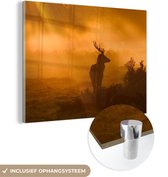 MuchoWow® Glasschilderij 80x60 cm - Schilderij acrylglas - Silhouet van een hert met zonnestralen - Foto op glas - Schilderijen