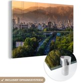 MuchoWow® Glasschilderij 120x80 cm - Schilderij acrylglas - Groene bebossing in de Iraanse stad Teheran - Foto op glas - Schilderijen