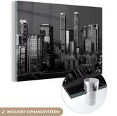 MuchoWow® Glasschilderij 90x60 cm - Schilderij acrylglas - Skyline van Los Angeles in de avond - zwart wit - Foto op glas - Schilderijen