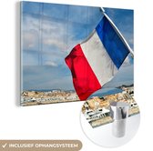 MuchoWow® Glasschilderij 180x120 cm - Schilderij acrylglas - Franse vlag met uitzicht op Cannes - Foto op glas - Schilderijen