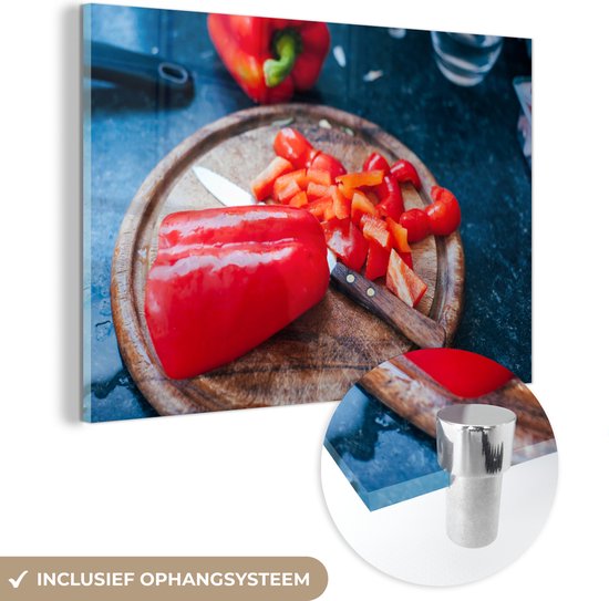 MuchoWow® Glasschilderij 90x60 cm - Schilderij acrylglas - Gehakte rode paprika op een houten ondergrond - Foto op glas - Schilderijen