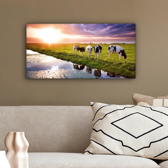 Tableau sur toile Vaches pendant un coucher de soleil - 40x20 cm - Décoration murale Art