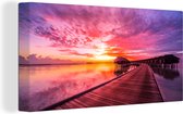 OneMillionCanvasses - Canvas schilderij - Pier - Horizon - Roze - Zon - Zee - Schilderijen op canvas - Canvas doek - 160x80 cm - Muurdecoratie