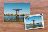 Puzzel Molen - Bloemen - Water - Nederland - Legpuzzel - Puzzel 500 stukjes