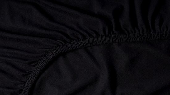 Zwart jersey hoeslaken met elastische rand.