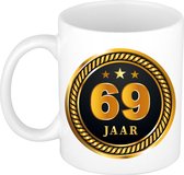 69 jaar cadeau mok / beker medaille goud zwart voor verjaardag/ jubileum