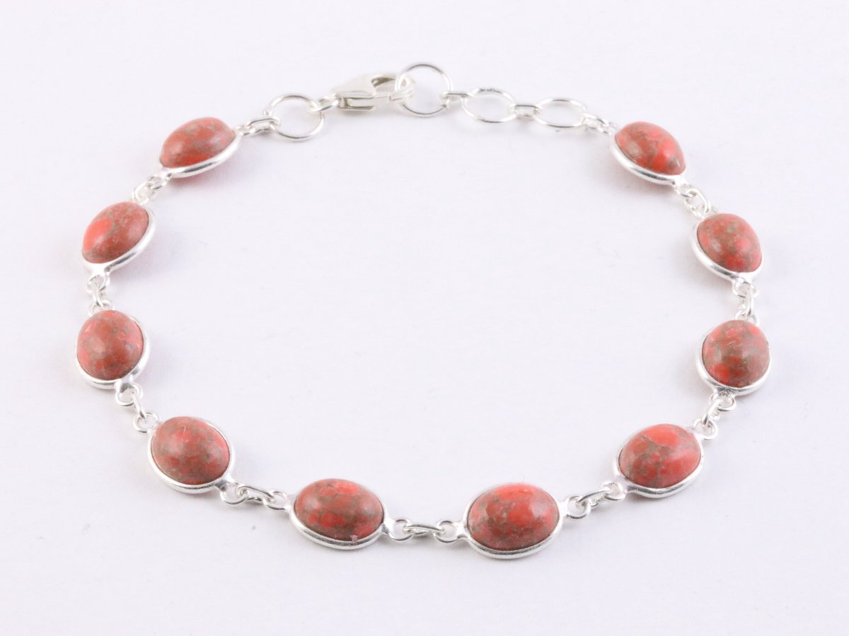 Fijne zilveren schakelarmband met rode koperturkoois