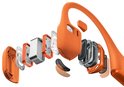 Exploded view van de oranje Shokz-hoofdtelefoon die de interne onderdelen en drivers toont.