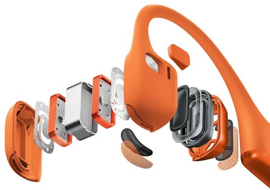 Exploded view van de oranje Shokz-hoofdtelefoon die de interne onderdelen en drivers toont.
