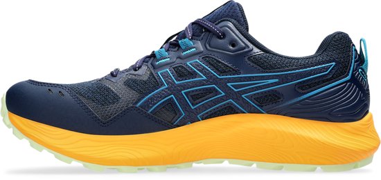 Zijprofiel van marineblauwe trailschoenen met oranje zolen en blauwe ASICS-strepen.