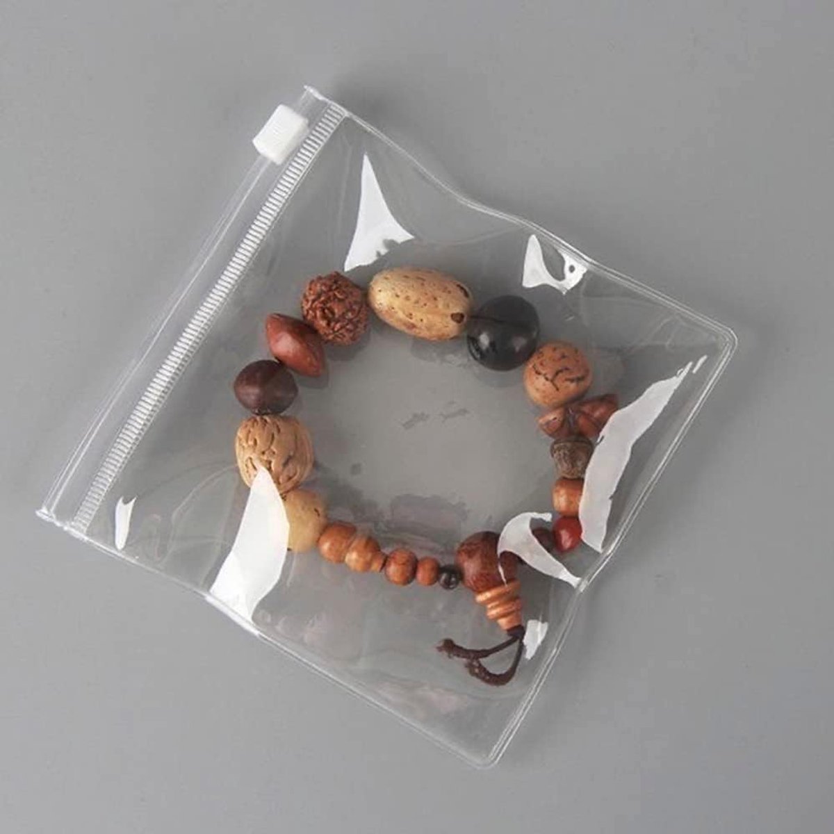 Reis sieraden organizer - Transparant - 11 x 11 cm - Herbruikbare PVC zak met ritssluiting - Voor kleine accessoires