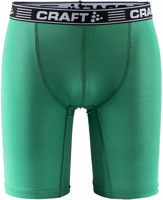 Groene Craft ondershort met zwart/wit gestreepte tailleband met Craft logo.