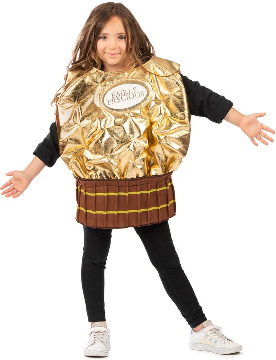 Enfant en costume de chocolat doré avec le texte 'FAIRLY PRECIOUS', portant un legging et un haut noirs.